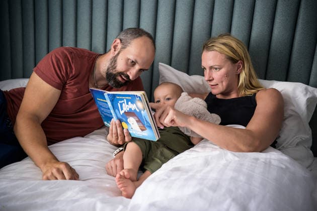 August 13, 2026: Swedish swimmer Sarah Sjöström and her husband Johan de Jong Skierus with their son Adrian in their hotel room on day 14 of the 2026 European Aquatics Championships on August 13, 2026 in Saint-Denis. Sarah Sjöström is back competing in her first championship since giving birth on August 26, 2025, with her sights set on competing at the 2028 Olympic Games in Los Angeles, which would mark her sixth consecutive appearance at the Games following her debut in 2008. Photo: Joel Marklund, BILDBYRAN. Code: JM JM0842 bbeng swimming 2026 European Aquatics Championships EM  Copyright: JOELxMARKLUND BB260813JM186