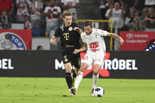 IPA87455931 - Kristoffer Zachariassen (Fer) and Michal Sacek (Gor) during the UEFA Europa League match between Gornik Zabrze and Ferencvaros at Arena Zabrze in Zabrze, Poland, on August 13, 2026  Copyright: xMichalxDubiel IPAxSportx xx 87455931