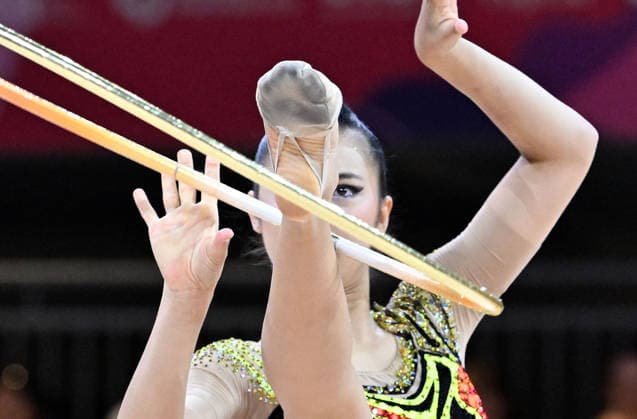 August 14, 2026, xhbx, 2026 Rhythmic Gymnastics World Championships, from left: Rin Keys (USA), hoop, DFL, DFB. REGULATIONS PROHIBIT ANY USE OF PHOTOGRAPHS AS IMAGE SEQUENCES AND OR QUASI-VIDEO. Frankfurt am Main