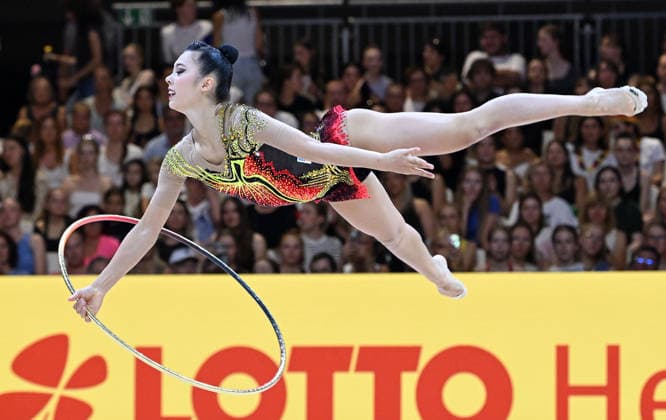 August 14, 2026, xhbx, 2026 Rhythmic Gymnastics World Championships, from left: Rin Keys (USA), hoop, DFL, DFB. REGULATIONS PROHIBIT ANY USE OF PHOTOGRAPHS AS IMAGE SEQUENCES AND OR QUASI-VIDEO. Frankfurt am Main