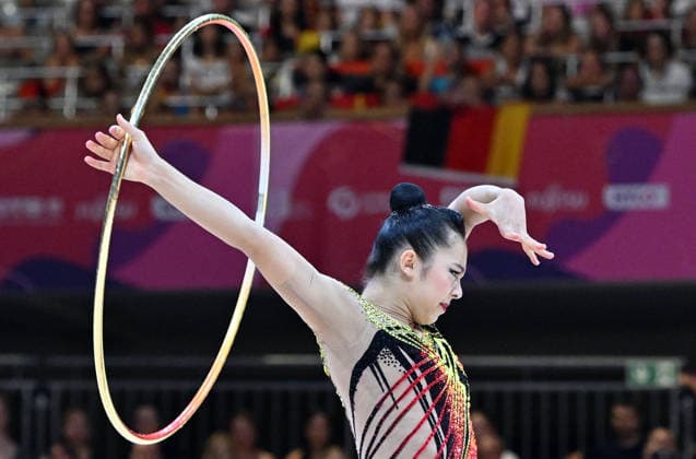 August 14, 2026, xhbx, 2026 Rhythmic Gymnastics World Championships, from left: Rin Keys (USA), hoop, DFL, DFB. REGULATIONS PROHIBIT ANY USE OF PHOTOGRAPHS AS IMAGE SEQUENCES AND OR QUASI-VIDEO. Frankfurt am Main