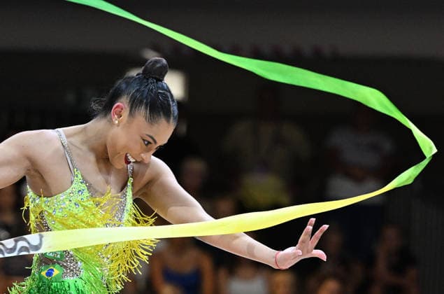 August 14, 2026, xhbx, 2026 Rhythmic Gymnastics World Championships, from left: Barbara Domingos, Brazil, ribbon. DFL, DFB REGULATIONS PROHIBIT ANY USE OF PHOTOGRAPHS AS IMAGE SEQUENCES AND OR QUASI-VIDEO. Frankfurt am Main