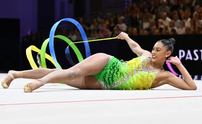 August 14, 2026, xhbx, 2026 Rhythmic Gymnastics World Championships, from left: Barbara Domingos, Brazil, ribbon. DFL, DFB REGULATIONS PROHIBIT ANY USE OF PHOTOGRAPHS AS IMAGE SEQUENCES AND OR QUASI-VIDEO. Frankfurt am Main