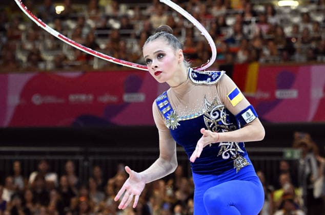 August 14, 2026, xhbx, 2026 Rhythmic Gymnastics World Championships, from left: Taisilia Onofriichuk (Ukraine), hoop; DFL, DFB. REGULATIONS PROHIBIT ANY USE OF PHOTOGRAPHS AS IMAGE SEQUENCES AND OR QUASI-VIDEO. Frankfurt am Main