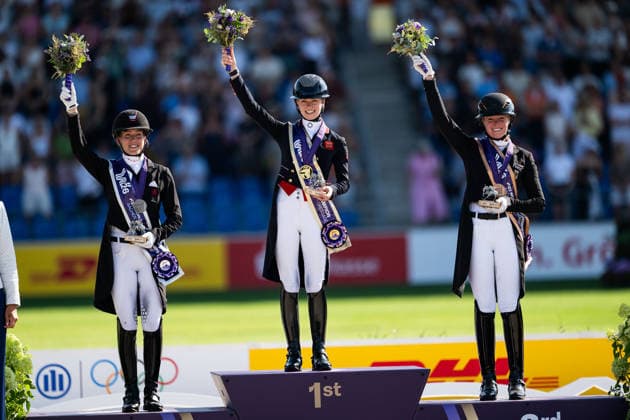 August 14, 2026: Cathrine Laudrup Dufour of Denmark, Charlotte Fry of Great Britain, and Katharina Hemmer of Germany celebrate on the podium after the Dressage Grand Prix Special on Day 4 of the 2026 FEI World Championships on August 14, 2026 in Aachen. Photo by Emma Wallskog. BILDBYRAN code EW EW0682 equestrian sports riding 2026 World Championships 2026 FEI World Championships BBENG equestrian sports World Championships dressage celebration  Copyright: EMMAxWALLSKOG BB260814EW110