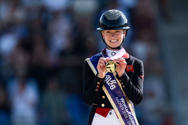 August 14, 2026: Charlotte Fry of Great Britain celebrates with her gold medal after winning the Dressage Grand Prix Special on Day 4 of the 2026 FEI World Championships on August 14, 2026 in Aachen. Photo by Emma Wallskog. BILDBYRAN code EW EW0682 equestrian sports 2026 World Championships 2026 FEI World Championships BBENG equestrian sports World Championships dressage celebration  Copyright: EMMAxWALLSKOG BB260814EW111