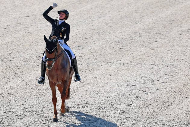 3rd place and bronze for Katharina Hemmer (GER, Germany) riding Denoix (PCH); victory celebration, victory fist, emotion, dressage, FEI Dressage World Championship MEGGLE Prize, Grand Prix Special, individual competition, Aachen FEI World Championships 2026, World Equestrian Festival, 2026 World Equestrian Championships, Aachen 2026, Welcome Home 2026, Aachen Soers, August 11–23, 2026, Equestrian sports, August 14, 2026, Aachen, Aachener Soers, Germany