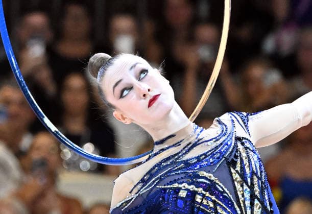August 14, 2026, xhbx, 2026 Rhythmic Gymnastics World Championships, from left: Darja Varfolomeev, Germany, hoop, DFL, DFB. REGULATIONS PROHIBIT ANY USE OF PHOTOGRAPHS AS IMAGE SEQUENCES AND OR QUASI-VIDEO. Frankfurt am Main
