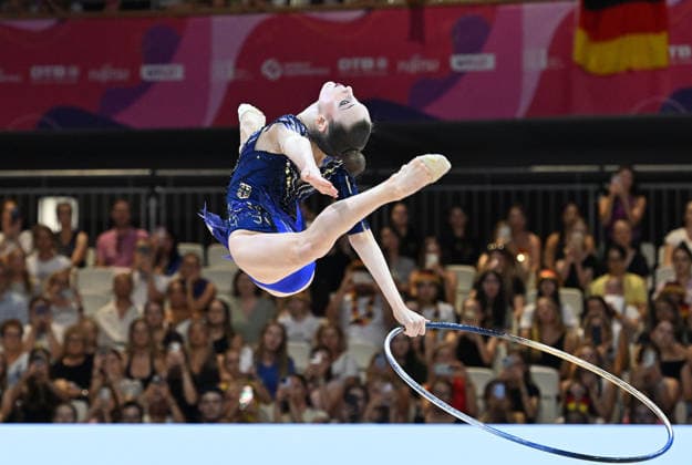 August 14, 2026, xhbx, 2026 Rhythmic Gymnastics World Championships, from left: Darja Varfolomeev, Germany, hoop, DFL, DFB. REGULATIONS PROHIBIT ANY USE OF PHOTOGRAPHS AS IMAGE SEQUENCES AND OR QUASI-VIDEO. Frankfurt am Main