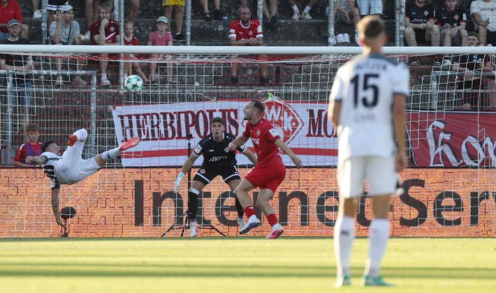 August 14, 2026, xfsx, Men s, Soccer, 2026–2027 Season, 3rd Division, Matchday 2: FC Würzburger Kickers vs. SV Wehen Wiesbaden (from left: Sinan Karweina, SV Wehen Wiesbaden; Johann Hipper, FC Würzburger Kickers; Leo Eberle, FC Würzburger Kickers; Justin Janitzek, SV Wehen Wiesbaden) in Würzburg at the AKON ARENA, Bavaria, Germany