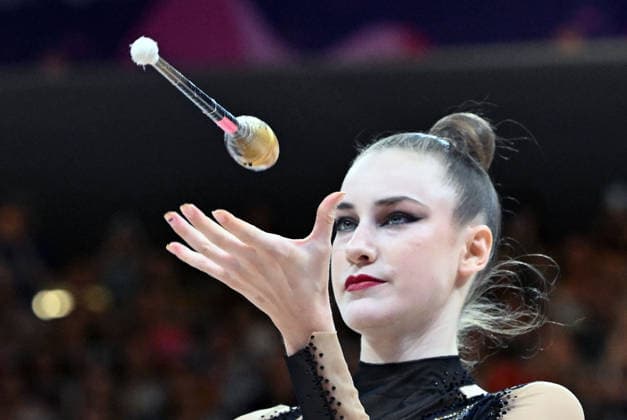August 14, 2026, xhbx, 2026 Rhythmic Gymnastics World Championships, from left: Darja Varfolomeev, Germany, Cologne, DFL, DFB. REGULATIONS PROHIBIT ANY USE OF PHOTOGRAPHS AS IMAGE SEQUENCES AND OR QUASI-VIDEO. Frankfurt am Main