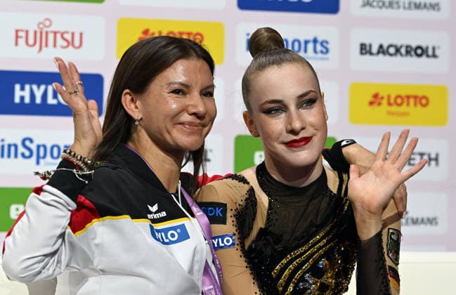 August 14, 2026, xhbx, 2026 Rhythmic Gymnastics World Championships, from left: Coach Julija Raskina, Darja Varfolomeev Germany Cologne DFL DFB REGULATIONS PROHIBIT ANY USE OF PHOTOGRAPHS AS IMAGE SEQUENCES AND OR QUASI-VIDEO Frankfurt am Main