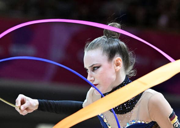 August 14, 2026, xhbx, 2026 Rhythmic Gymnastics World Championships, from left: Darja Varfolomeev, Germany, ribbon; DFL, DFB. REGULATIONS PROHIBIT ANY USE OF PHOTOGRAPHS AS IMAGE SEQUENCES AND OR QUASI-VIDEO. Frankfurt am Main