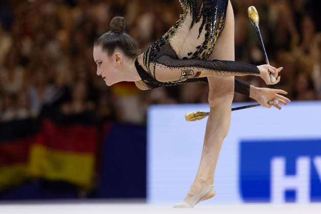 Rhythmic Gymnastics World Championships: Darja Varfolomeev of Germany during her clubs routine. Rhythmic Gymnastics World Championships, August 11–16 at the Festhalle in Frankfurt am Main. Individual All-Around Final, places 1 through 9, Frankfurt am Main, Hesse, Germany, Festhalle