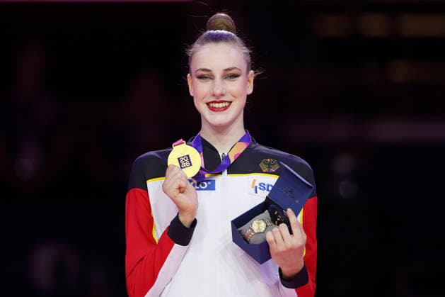 Darja Varfolomeev (GER) displays her gold medal after winning the individual all-around final at the 2026 Rhythmic Gymnastics World Championships in Frankfurt am Main, Germany, on August 14, 2026 Darja Varfolomeev (GER) presents her gold medal after winning the individual all-around final at the 2026 Rhythmic Gymnastics World Championships in Frankfurt am Main, Germany, on August 14, 2026 Copyright: HMBxMedia xHeikoxBecker