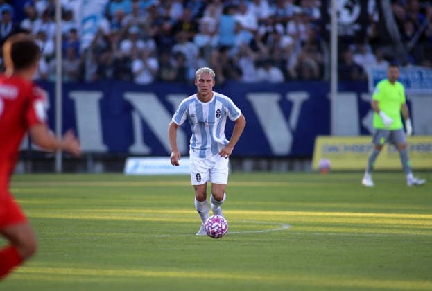 Soccer, Men s, Bavarian Regional League, 2026–2027 Season, FC Memmingen vs. TSV 1860 Munich, at Arena Park in Memmingen Stadium; Lasse Fassmann of TSV 1860 Munich with the ball during a build-up play