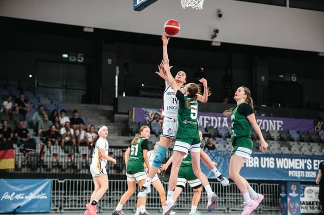 Mia Melissa Koloszar (14), Prototype Cup Germany 2025, drives to the basket and shoots the ball past the defense of Liepa Gelzinyte (5), Lithuania. The scene takes place at the Pitesti Arena during the FIBA U16 Women’s European Championship. Mia Melissa Koloszar (14), Prototype Cup Germany 2025 makes a layup against Lithuania Copyright: xJoelxKruehlerx