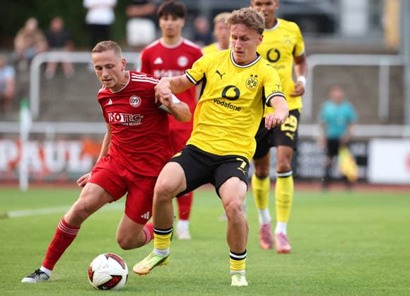 Friday, August 14, 2026, 2026–27 season, Matchday 3 of the Regionalliga West at the Belkaw Arena in Bergisch Gladbach: SV Bergisch Gladbach 09 vs. BVB 09 Borussia Dortmund II; Tim Degener of BVB II in a tackle
