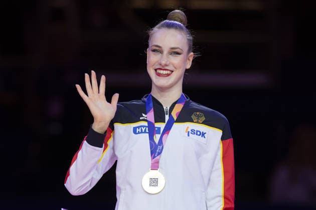 Rhythmic Gymnastics World Championships Award Ceremony: World Champion Darja Varfolomeev, Germany Rhythmic Gymnastics World Championships, August 11–16 at the Festhalle in Frankfurt am Main Individual All-Around Final, Places 1–9, Frankfurt am Main, Hesse, Germany, Festhalle