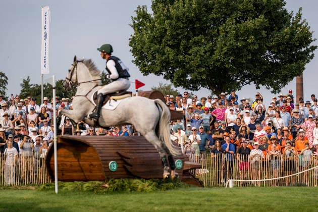 August 15, 2026: Spectators behind Ian Cassells of Ireland, riding Millridge Atlantis, compete in the Eventing Cross Country on Day 5 of the 2026 FEI World Championships on August 15, 2026 in Aachen. Photo by Emma Wallskog. BILDBYRAN code EW EW0685 equestrian sports riding 2026 World Championships 2026 FEI World Championships BBENG equestrian sports World Championships eventing cross-country riding cross-country course spectators  Copyright: EMMAxWALLSKOG BB260815EW008
