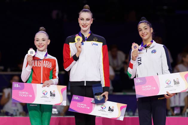 Medal ceremony for the individual all-around final at the 2026 Rhythmic Gymnastics World Championships in Frankfurt am Main, Germany, on August 14, 2026 (from left): Stiliana Nikolova of Bulgaria (silver), Darja Varfolomeev of Germany (gold), and Sofia Raffaeli of Italy, bronze, with their medals and Olympic qualification tickets. Medal ceremony of the individual all-around final at the 2026 Rhythmic Gymnastics World Championships in Frankfurt am Main, Germany, on August 14, 2026; from left to right: Stiliana Nikolova of Bulgaria, bronze; Darja Varfolomeev of Germany, gold; and Sofia Raffaeli of Italy, silver, with their medals and Olympic qualification tickets Copyright: HMBxMedia xHeikoxBecker