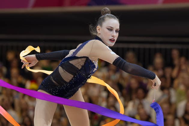 Rhythmic Gymnastics World Championships: Darja Varfolomeev of Germany during her ribbon routine. Rhythmic Gymnastics World Championships, August 11–16 at the Festhalle in Frankfurt am Main. Individual All-Around Final, places 1 through 9, Frankfurt am Main, Hesse, Germany, Festhalle