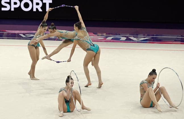 August 15, 2026, xhbx, 2026 Rhythmic Gymnastics World Championships, from left: Team, Group, Austrian Team, Clubs, Hoop, Frankfurt am Main