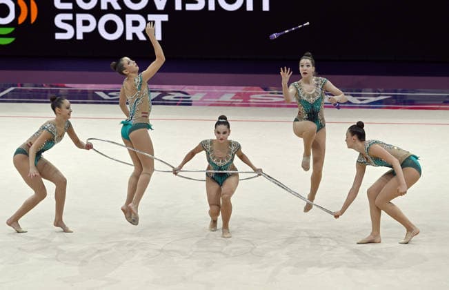 August 15, 2026, xhbx, 2026 Rhythmic Gymnastics World Championships, from left: Team, Group, Austrian Team, Clubs, Hoop, Frankfurt am Main