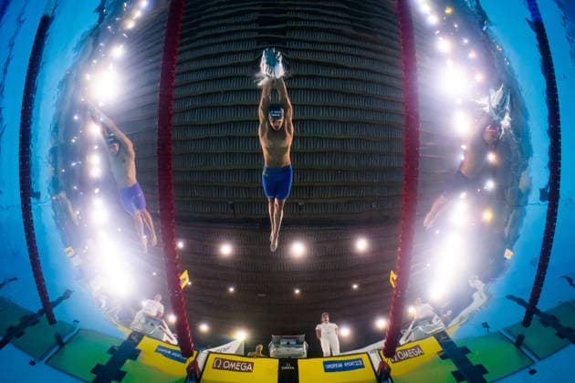 August 15, 2026: Jarno Baschnitt of Germany, Ludvig Bartolek of Sweden, and Tyler Melbourne Smith of Great Britain compete in the mixed 4x200-meter freestyle swimming relay heats during Day 16 of the 2026 European Aquatics Championships on August 15, 2026 in Saint Denis. Photo by Joel Marklund. BILDBYRAN code JM JM0844 bbeng swimming 2026 European Aquatics Championships European Championships relay Sweden  Copyright: JOELxMARKLUND BB260815JM039