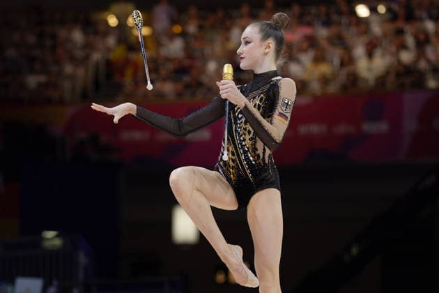 Rhythmic Gymnastics World Championships: Darja Varfolomeev of Germany during her clubs routine. Rhythmic Gymnastics World Championships, August 11–16 at the Festhalle in Frankfurt am Main. Individual All-Around Final, places 1 through 9, Frankfurt am Main, Hesse, Germany, Festhalle