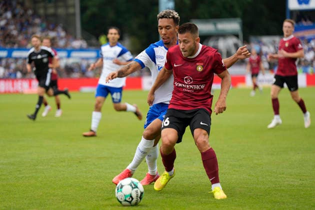 August 15, 2026, Hänsch Arena, Meppen, GER, 3rd Division, Matchday 2: SV Meppen vs. SG Sonnenhof Großaspach, Marius Kunde (SG Sonnenhof Großaspach 16) vs. Oliver Schmitt (SV Meppen 7) DFL REGULATIONS PROHIBIT ANY USE OF PHOTOGRAPHS AS IMAGE SEQUENCES AND OR QUASI-VIDEO Meppen, Lower Saxony, Hänsch Arena