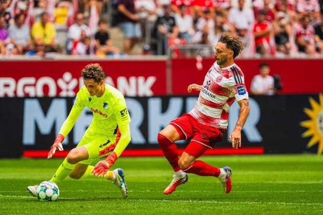 Lukas Petersson (TSG Hoffenheim II), 01, makes a save against Fabian Schleusener (Fortuna Düsseldorf), 24; Fortuna Düsseldorf vs. TSG Hoffenheim II, Soccer, 3rd Division, Matchday 02, 2026–27 Season, August 15, 2026, DFL regulations prohibit any use of photographs as image sequences and or quasi-video, Fortuna Düsseldorf vs. TSG Hoffenheim II, soccer, 3. Liga, Matchday 2, 2026–27 Season, August 15, 2026, Düsseldorf Copyright: xEibner-Pressefoto LukasxBaldygax EP_LBA