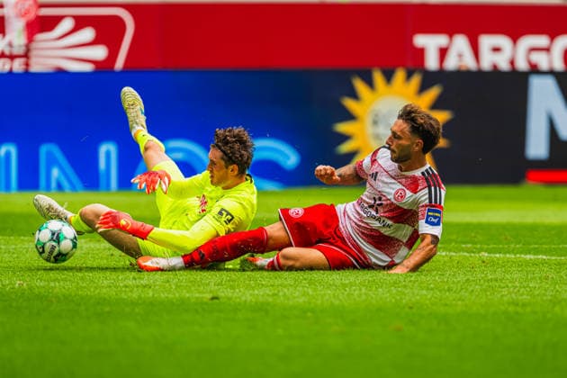 Lukas Petersson (TSG Hoffenheim II), No. 01, makes a save against Fabian Schleusener (Fortuna Düsseldorf), No. 24, as he slides in; Fortuna Düsseldorf vs. TSG Hoffenheim II, soccer, 3. Liga, Matchday 02, 2026–27 season, August 15, 2026, DFL regulations prohibit any use of photographs as image sequences and or quasi-video, Fortuna Düsseldorf vs. TSG Hoffenheim II, soccer, 3. Liga, Matchday 2, 2026–27 Season, August 15, 2026, Düsseldorf Copyright: xEibner-Pressefoto LukasxBaldygax EP_LBA