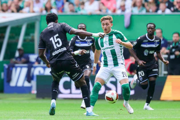 Christ Makosso of AJ Auxerre and Ivan San Jose Cantalejo Chuki of Werder Bremen battle for the ball during the friendly match between Werder Bremen and AJ Auxerre at the Weserstadion on August 15, 2026, in Bremen, Germany. Photo by Marco Steinbrenner, DeFodi Images. Christ Makosso of AJ Auxerre and Ivan San Jose Cantalejo Chuki of Werder Bremen battle for the ball during the friendly match between Werder Bremen and AJ Auxerre at the Weserstadion on August 15, 2026 in Bremen, Germany Photo by Marco Steinbrenner DeFodi Images Photo by Marco Steinbrenner DeFodi Images
