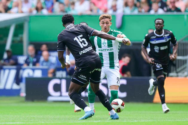 Christ Makosso of AJ Auxerre and Ivan San Jose Cantalejo Chuki of Werder Bremen battle for the ball during the friendly match between Werder Bremen and AJ Auxerre at the Weserstadion on August 15, 2026, in Bremen, Germany. Photo by Marco Steinbrenner, DeFodi Images. Christ Makosso of AJ Auxerre and Ivan San Jose Cantalejo Chuki of Werder Bremen battle for the ball during the friendly match between Werder Bremen and AJ Auxerre at the Weserstadion on August 15, 2026 in Bremen, Germany Photo by Marco Steinbrenner DeFodi Images Photo by Marco Steinbrenner DeFodi Images