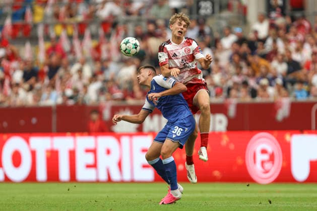Jakov Dedic of TSG Hoffenheim II and Elias Arden of Fortuna Düsseldorf battle for the ball during the 3. Liga match between Fortuna Düsseldorf and TSG 1899 Hoffenheim II at the Merkur Spiel Arena on August 15, 2026, in Düsseldorf, Germany. Photo by Oliver Kaelke, DeFodi Images. Jakov Dedic of TSG Hoffenheim II and Elias Arden of Fortuna Düsseldorf battle for the ball during the 3. Liga match between Fortuna Düsseldorf and TSG 1899 Hoffenheim II at Merkur Spiel Arena on August 15, 2026 in Düsseldorf, Germany. Photo by Oliver Kaelke, DeFodi Images. DFB and DFL regulations prohibit any use of photographs as image sequences and or quasi-video. Photo by Oliver Kaelke, DeFodi Images.
