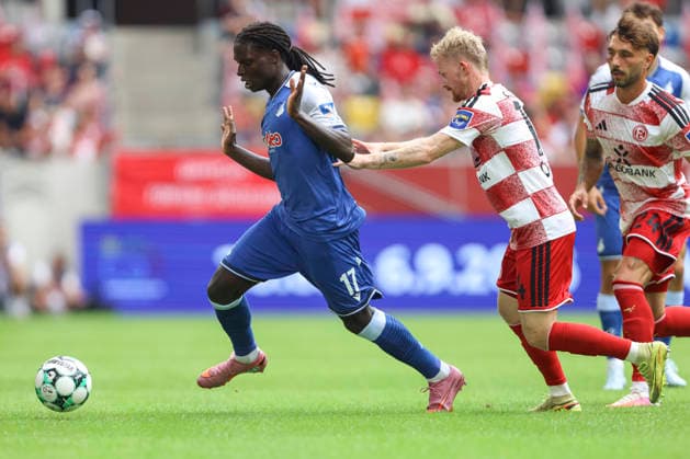 Blessing Miguel Makanda of TSG Hoffenheim II and Jomaine Consbruch of Fortuna Düsseldorf in a tackle during the 3. Liga match between Fortuna Düsseldorf and TSG 1899 Hoffenheim II, Merkur Spiel Arena on August 15, 2026, in Düsseldorf, Germany. Photo by Oliver Kaelke, DeFodi Images. Blessing Miguel Makanda of TSG Hoffenheim II and Jomaine Consbruch of Fortuna Düsseldorf battle for the ball during the 3. Liga match between Fortuna Düsseldorf and TSG 1899 Hoffenheim II at Merkur Spiel Arena on August 15, 2026 in Düsseldorf, Germany. Photo by Oliver Kaelke, DeFodi Images. DFB and DFL regulations prohibit any use of photographs as image sequences and or quasi-video. Photo by Oliver Kaelke, DeFodi Images.