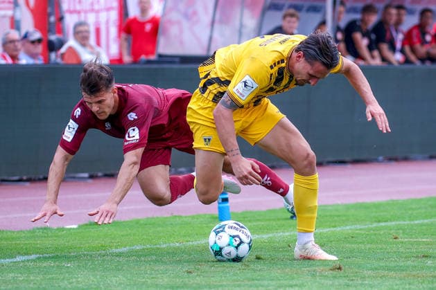 August 15, 2026, xsefx, Soccer, SC Fortuna Köln vs. TSV Alemannia Aachen, 3rd Division, Südstation, Matchday 2, 2026–2027 Season: Nico Thier of Fortuna Cologne 07 in a tackle against Petros Bagalianis of Alemannia Aachen 02. DFB regulations prohibit any use of photographs as image sequences and or quasi-video. North Rhine-Westphalia, Germany