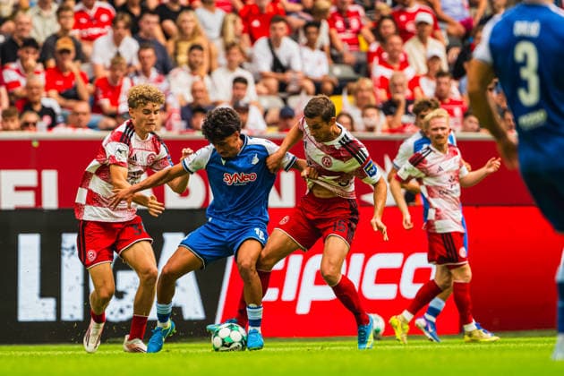 Elias Arden of Fortuna Düsseldorf (No. 38) is in a tackle with Yasin Zor of TSG Hoffenheim II (No. 10), and Jomaine Consbruch of Fortuna Düsseldorf (No. 14) comes to his aid. Fortuna Düsseldorf vs. TSG Hoffenheim II, Soccer, 3. Liga, Matchday 02, 2026–27 season, August 15, 2026, DFL regulations prohibit any use of photographs as image sequences and or quasi-video, Fortuna Düsseldorf vs. TSG Hoffenheim II, soccer, 3. Liga, Matchday 2, 2026–27 Season, August 15, 2026, Düsseldorf Copyright: xEibner-Pressefoto LukasxBaldygax EP_LBA
