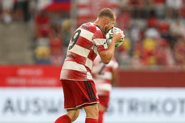 Eric Hottmann of Fortuna Düsseldorf gestures; he is disappointed and bites the ball during the 3. Liga match between Fortuna Düsseldorf and TSG 1899 Hoffenheim II, Merkur Spiel Arena on August 15, 2026, in Düsseldorf, Germany. Photo by Oliver Kaelke, DeFodi Images. Eric Hottmann of Fortuna Düsseldorf gestures, looks dejected, and bites into the ball during the 3. Liga match between Fortuna Düsseldorf and TSG 1899 Hoffenheim II at Merkur Spiel Arena on August 15, 2026 in Düsseldorf, Germany. Photo by Oliver Kaelke, DeFodi Images. DFB and DFL regulations prohibit any use of photographs as image sequences and or quasi-video. Photo by Oliver Kaelke, DeFodi Images.