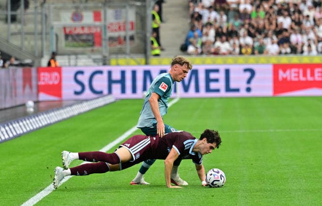 August 15, 2026, Mönchengladbach Soccer, Men s, 2026–2027 season, Friendly match: Borussia Mönchengladbach vs. Aston Villa. Tackle between Robin Hack (Gladbach, top) and Kosta Nedeljkovic (Aston Villa, bottom). DFL regulations prohibit any use of photographs as image sequences and or quasi-video content. Borussia Park, North Rhine-Westphalia, Germany