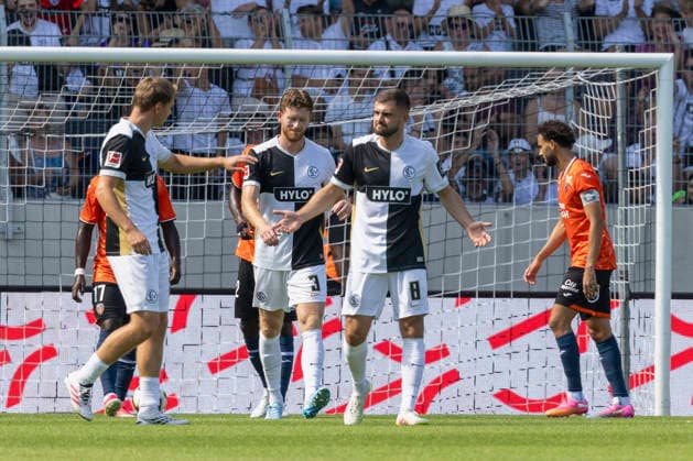 Pictured: Celebrations after the 1-0 goal; from left: Lasse Guenther (SV 07 Elversberg), 21, Florian Le Joncour of SV 07 Elversberg, 3, and goal scorer Lukasz Poreba of SV 07 Elversberg, 8, August 15, 2026, 1st Bundesliga, Friendly Match, SV 07 Elversberg vs. FC Lorient, Germany, Spiesen Elversberg, URSAPHARM Arena, DFL REGULATIONS PROHIBIT ANY USE OF PHOTOGRAPHS AS IMAGE SEQUENCES AND OR QUASI-VIDEO Copyright: HMBxMedia xJulienxBecker