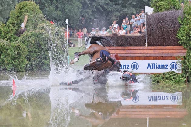 Toshiyuki Tanaka (JPN), Japan, riding Jefferson (JRA), falls at the Allianz Complex during the cross-country leg of the FEI Eventing World Championship, DHL Prize, Individual and Team Events, Cross-Country Test, Cross-Country, AACHEN FEI World Championships 2026, World Equestrian Festival, 2026 World Equestrian Championships, Aachen 2026, Welcome Home 2026, Aachen Soers, August 11–23, 2026, Equestrian Sports, August 15, 2026, Aachen Soers, Germany