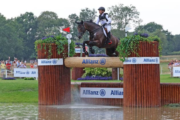 Michael Jung GER, Germany, with his horse fischerChipmunk FRH, Chipmunk FRH, Allianz Insurance, water jump, eventing dressage, FEI Eventing World Championship, DHL Prize, individual and team competitions, cross-country test, cross-country stage, cross-country, AACHEN FEI World Championships 2026, World Festival of Equestrian Sports, 2026 Equestrian World Championships, Aachen 2026, Welcome Home 2026, Aachen Soers, August 11–23, 2026, Equestrian Sports, August 15, 2026, Aachen Soers, Germany