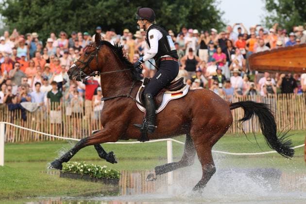 Libussa Lübbeke GER, Germany, riding Caramia FRH, Allianz Insurance, water jump, eventing dressage, FEI Eventing World Championship, DHL Prize, individual and team competitions, cross-country test, cross-country stage, cross-country, AACHEN FEI World Championships 2026, World Equestrian Festival, 2026 World Equestrian Championships, Aachen 2026, Welcome Home 2026, Aachen Soers, August 11–23, 2026, Equestrian Sports, August 15, 2026, Aachen Soers, Germany