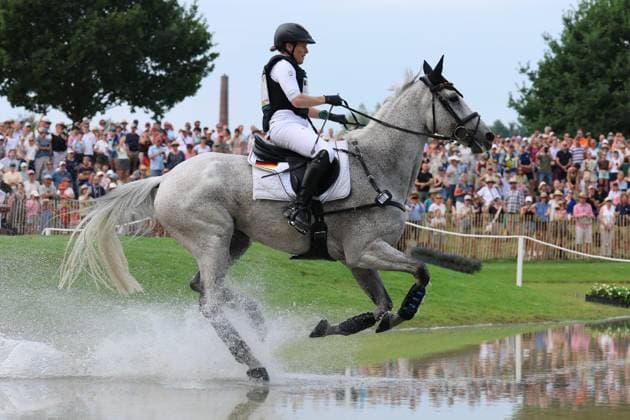 Malin Hansen Hotopp GER, Germany, with her horse Carlitos Quidditch K, Allianz Insurance, Water Jumping, Eventing Dressage, FEI Eventing World Championship, DHL Prize, Individual and Team, Cross-Country, Cross-Country Stage, AACHEN FEI World Championships 2026, World Festival of Equestrian Sports, 2026 Equestrian World Championships, Aachen 2026, Welcome Home 2026, Aachen Soers, August 11–23, 2026, Equestrian Sports, August 15, 2026, Aachen Soers, Germany
