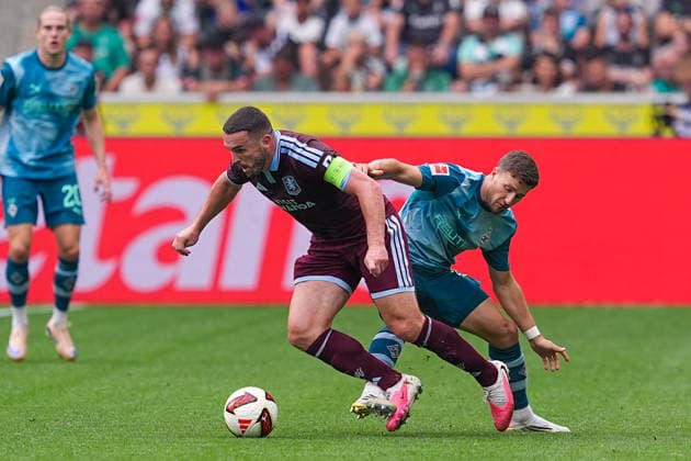 August 15, 2026, xydrx, Men s, Soccer, Season Opener, Borussia Mönchengladbach vs. Aston Villa, 2026–2027 Season, at Borussia Park: John McGinn (Aston Villa) in a tackle with Enzo Leopold (Borussia Mönchengladbach). DFB regulations prohibit any use of photographs as image sequences and or quasi-video. Copyright: HMBxMedia YannisxDreimann