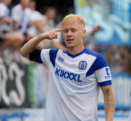 August 15, 2026, Hänsch Arena, Meppen, GER, 3rd Division, Matchday 2: SV Meppen vs. SG Sonnenhof Großaspach, Luca Prasse of SV Meppen, No. 31, celebrates with gestures after scoring the 2–0 goal. DFL REGULATIONS PROHIBIT ANY USE OF PHOTOGRAPHS AS IMAGE SEQUENCES AND OR QUASI-VIDEO. Meppen, Lower Saxony, Hänsch Arena