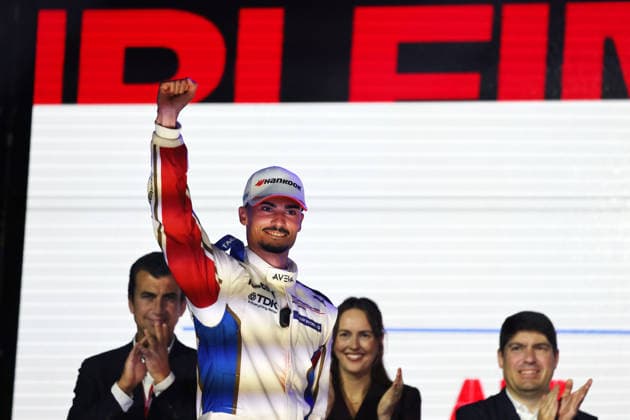 Pascal Wehrlein (GER) in the No. 94 Porsche, raising his fist in victory on the podium, Race 1, FIA Formula E World Championship, Season 12, London E-Prix, August 15, 2026, Excel Exhibition Center,