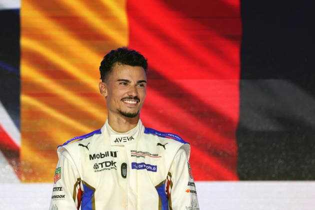 Winner Pascal Wehrlein (GER) in a Porsche 94 on the podium, Race 1, FIA Formula E World Championship, Season 12, London E-Prix, August 15, 2026, Excel Exhibition Center, standing in front of the German flag during the national anthem